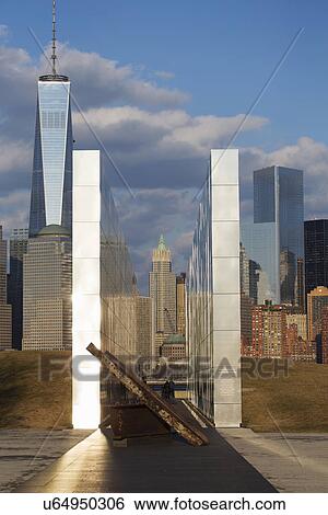 "Empty Sky: Jersey City 9/11 Memorial at sunset shows iron beam from W. T. C., New Jersey, USA" View Large Photo Image Stock Photograph - "Empty Sky: Jersey City 9/11 Memorial at sunset shows iron beam from W. T. C., New Jersey, USA". Fotosearch