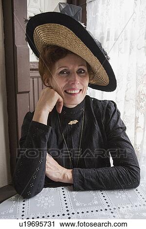 Stock Image - "Female in Victorian Dress, Reenactor Durango and Silverton Narrow Gauge Railroad, Colorado, USA". Fotosearch