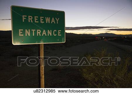 Stock Photography - "Freeway Entrance road sign at sunset, onto Interstate 10, California, USA". Fotosearch
