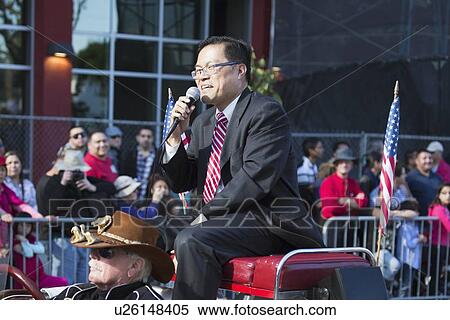 Stock Photography - "Grand Marshall Mike Fong, 115th Golden Dragon Parade, Chinese New Year, 2014, Year of the Horse, Los Angeles, California, USA". Fotosearch