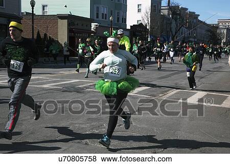 "Joggers, South Boston, St. Patrick's Day Road Race, South Boston, Massachusetts, USA" View Large Photo Image Stock Photo - "Joggers, South Boston, St. Patrick's Day Road Race, South Boston, Massachusetts, USA". Fotosearch