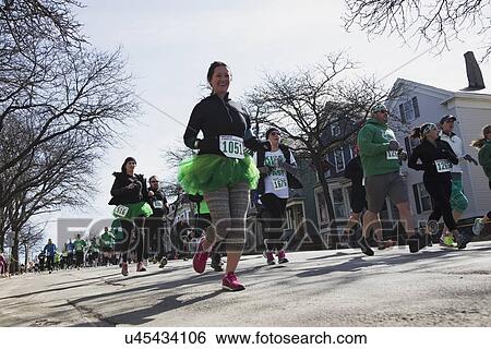 "Joggers, South Boston, St. Patrick's Day Road Race, South Boston, Massachusetts, USA" View Large Photo Image Stock Photograph - "Joggers, South Boston, St. Patrick's Day Road Race, South Boston, Massachusetts, USA". Fotosearch