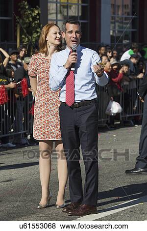 Stock Photo - "Los Angeles Mayor Eric Garcetti and wife, Jacque McMillan march in 115th Golden Dragon Parade, Chinese New Year, Los Angeles, California, USA". Fotosearch