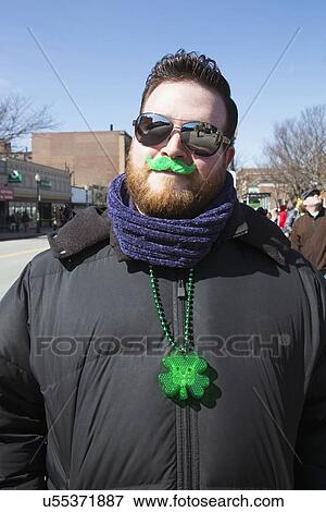 Stock Photo - "Man and green mustache, St. Patrick's Day Parade, 2014, South Boston, Massachusetts, USA". Fotosearch