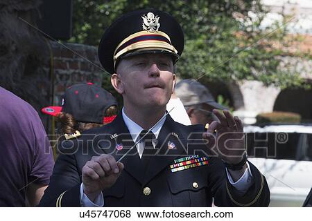 "Military band conductor at Los Angeles National Cemetery Annual Memorial Event, May 26, 2014, California, USA" View Large Photo Image Stock Photo - "Military band conductor at Los Angeles National Cemetery Annual Memorial Event, May 26, 2014, California, USA". Fotosearch