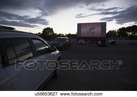 "Movie viewers in car at Star Drive In Movie Theater, Montrose, Colorado, USA" View Large Photo Image Stock Photo - "Movie viewers in car at Star Drive In Movie Theater, Montrose, Colorado, USA". Fotosearch