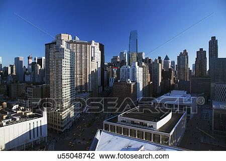 "New York City skyline looking south down Broadway from Lincoln Center, New York City, New York, USA" View Large Photo Image Stock Image - "New York City skyline looking south down Broadway from Lincoln Center, New York City, New York, USA". Fotosearch