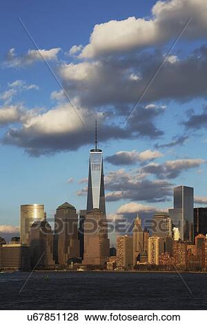 Stock Photo - "New York City Skyline on water featuring One World Trade Center (1WTC), Freedom Tower, New York City, New York, USA". Fotosearch