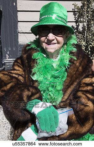 Picture - "Older woman in green, St. Patrick's Day Parade, 2014, South Boston, Massachusetts, USA". Fotosearch