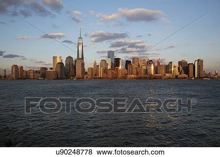 "Panoramic view of New York City Skyline on water featuring One World Trade Center (1WTC), Freedom Tower, New York City, New York, USA" View Large Photo Image Stock Photo - "Panoramic view of New York City Skyline on water featuring One World Trade Center (1WTC), Freedom Tower, New York City, New York, USA". Fotosearch