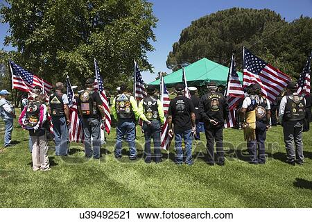 Stock Image - "Patriot Guard Motorcyclists honor fallen US Soldier, PFC Zach Suarez, ""Honor Mission"" on Highway 23, drive to Memorial Service, Westlake Village, California, USA". Fotosearch