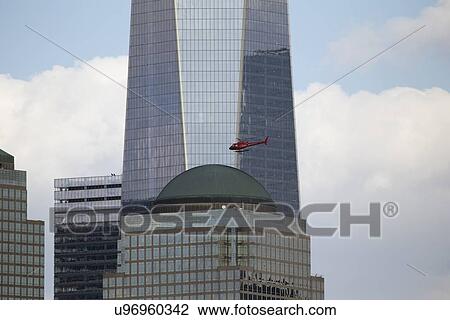 "Red Helicopter flies in front of new One World Trade Center (1WTC), Freedom Tower, New York City, New York, USA City, New York, USA" View Large Photo Image Stock Image - "Red Helicopter flies in front of new One World Trade Center (1WTC), Freedom Tower, New York City, New York, USA City, New York, USA". Fotosearch