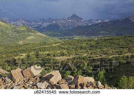 Stock Photography - "San Juan Mountains and storm clouds, Dallas Divide, Route 62, to Ridgway / Telluride, Colorado, USA". Fotosearch