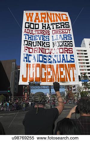 Stock Photography - "Sign for Christian extremist, anti-homosexual and atheists, hold sign, Chinese New Year, Los Angeles, California, USA". Fotosearch