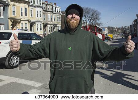 Stock Image - """Southie"" gives thumbs up, St. Patrick's Day Parade, 2014, South Boston, Massachusetts, USA". Fotosearch