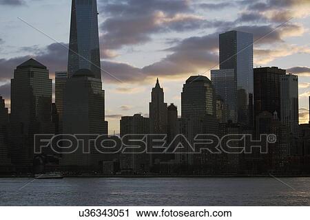 Stock Image - "Sunrise on One World Trade Center (1WTC), Freedom Tower, New York City skyline, New York City, New York, USA". Fotosearch