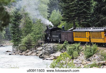 "The Durango and Silverton Narrow Gauge Railroad Steam Engine travels along Animas River, Colorado, USA" View Large Photo Image Stock Image - "The Durango and Silverton Narrow Gauge Railroad Steam Engine travels along Animas River, Colorado, USA". Fotosearch