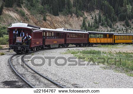 Stock Photo - "Three Brakemen on Durango and Silverton Narrow Gauge Railroad Steam Engine Train, Silverton, Colorado, USA". Fotosearch
