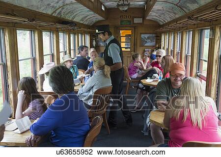 Stock Image - "Tourists on Durango and Silverton Narrow Gauge Railroad Steam Engine Train, Durango, Colorado, USA". Fotosearch