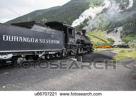 "Two trains, Durango and Silverton Narrow Gauge Railroad featuring Steam Engine, Silverton, Colorado, USA" View Large Photo Image Stock Image - "Two trains, Durango and Silverton Narrow Gauge Railroad featuring Steam Engine, Silverton, Colorado, USA". Fotosearch