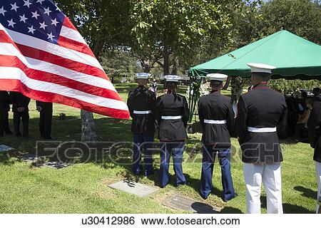 Stock Photograph - "US Marines at ease at Memorial Service for fallen US Soldier, PFC Zach Suarez, ""Honor Mission"", Westlake Village, California, USA". Fotosearch