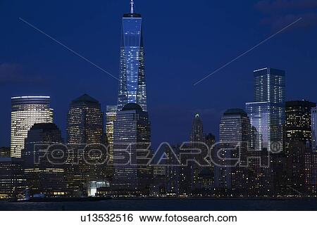 "View of New York City Skyline at dusk featuring One World Trade Center (1WTC), Freedom Tower, New York City, New York, USA" View Large Photo Image Stock Photograph - "View of New York City Skyline at dusk featuring One World Trade Center (1WTC), Freedom Tower, New York City, New York, USA". Fotosearch