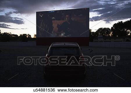 Stock Photograph - "Views in car watch movie Star Drive In Movie Theater, Montrose, Colorado, USA". Fotosearch