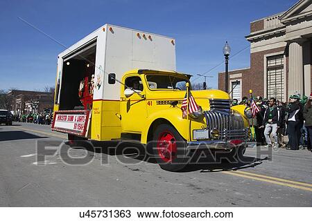 Stock Image - "Vintage Yellow Coke Truck, St. Patrick's Day Parade, 2014, South Boston, Massachusetts, USA". Fotosearch