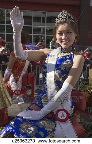 Stock Image - "Waving Princess, 115th Golden Dragon Parade, Chinese New Year, 2014, Year of the Horse, Los Angeles, California, USA". Fotosearch