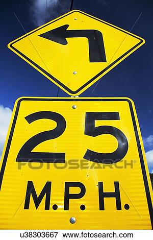 Yellow street sign saying 25 Miles Per House View Large Photo Image Stock Photo - Yellow street sign saying 25 Miles Per House. Fotosearch