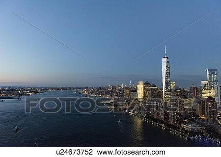 Stock Image - Aerial view of Manhattan and One World Trade Center. Fotosearch