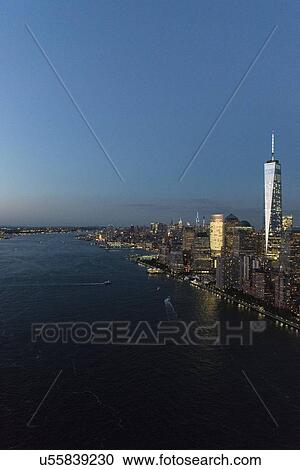 Stock Image - Aerial view of Manhattan and One World Trade Center. Fotosearch