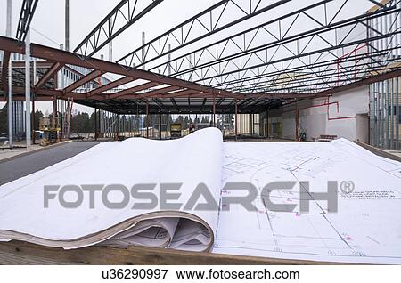 Stock Photo - Architectual plans on table. Fotosearch