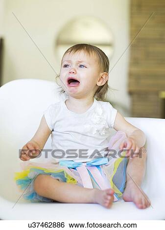 Baby girl (12-17 months) crying View Large Photo Image Stock Photograph - Baby girl (12-17 months) crying. Fotosearch