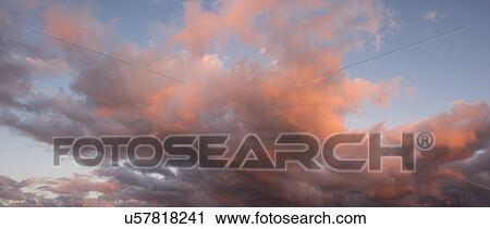 Beautiful cloudscape at sunset View Large Photo Image Stock Image - Beautiful cloudscape at sunset. Fotosearch
