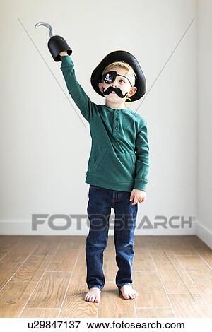 Boy (2-3) dressed up as pirate View Large Photo Image Stock Photo - Boy (2-3) dressed up as pirate. Fotosearch