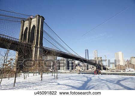 Brooklyn Bridge and cityscape in winter View Large Photo Image Stock Image - Brooklyn Bridge and cityscape in winter. Fotosearch