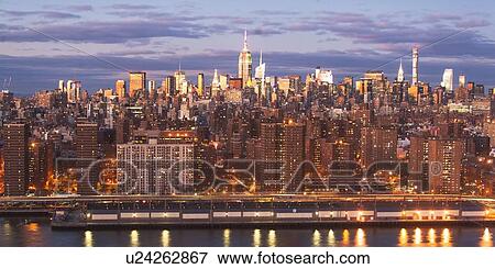 Cityscape at sunset View Large Photo Image Stock Photo - Cityscape at sunset. Fotosearch