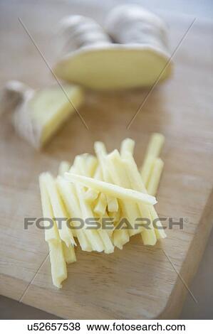 Close-up of chopped ginger View Large Photo Image Stock Photo - Close-up of chopped ginger. Fotosearch