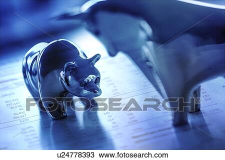 Close up of figurines of bull and bear on date View Large Photo Image Stock Image - Close up of figurines of bull and bear on date. Fotosearch