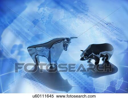 Stock Photography - Close up of figurines of bull and bear on world map. Fotosearch