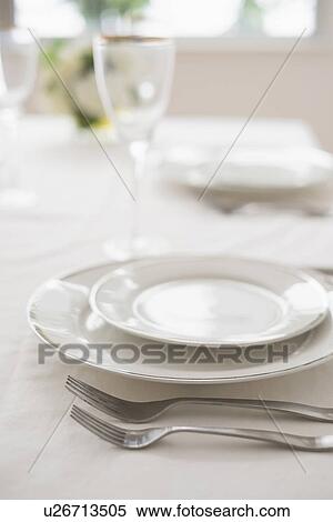 Stock Photography - Close up of place setting in restaurant. Fotosearch