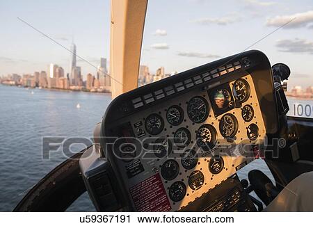 Cockpit in helicopter and Manhattan skyline View Large Photo Image Stock Image - Cockpit in helicopter and Manhattan skyline. Fotosearch