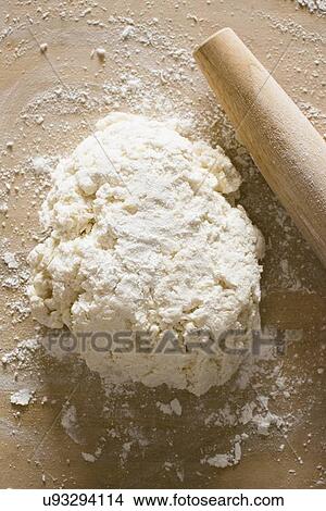 Dough and rolling pin View Large Photo Image Picture - Dough and rolling pin. Fotosearch