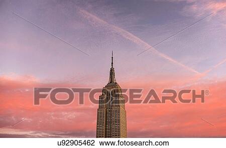 Empire State Building with sunset sky View Large Photo Image Stock Image - Empire State Building with sunset sky. Fotosearch