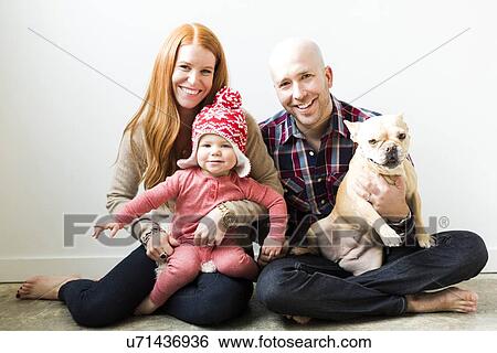 Family with baby son (2-3) and pug View Large Photo Image Stock Photograph - Family with baby son (2-3) and pug. Fotosearch