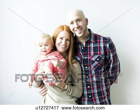 Stock Photo - Family with baby son (2-3). Fotosearch