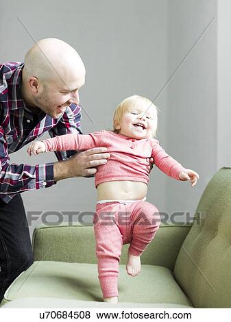 Father holding baby son (2-3) View Large Photo Image Stock Photo - Father holding baby son (2-3). Fotosearch