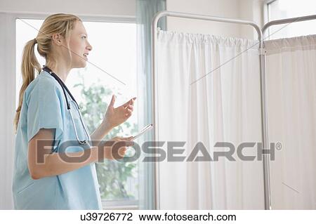 Female doctor in hospital View Large Photo Image Stock Image - Female doctor in hospital. Fotosearch