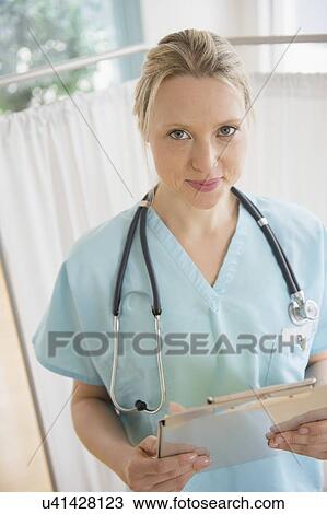 Female doctor in hospital View Large Photo Image Stock Image - Female doctor in hospital. Fotosearch